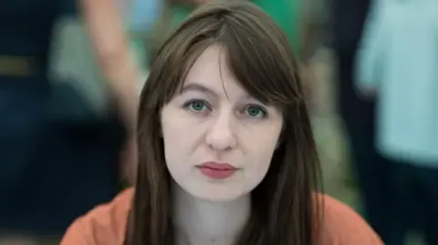 Irish author Sally Rooney states she cannot enter the UK because of legal concerns